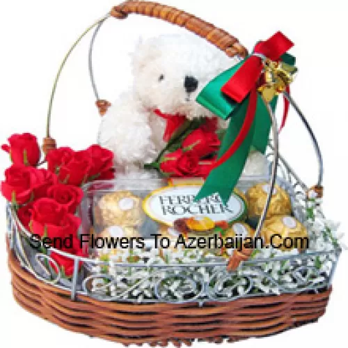 Un beau panier composé de roses, 16 pièces de Ferrero Rochers et un mignon ours en peluche blanc