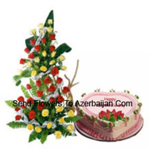 Tall Arrangement Of 101 Red Roses Along With A 1 Kg Heart Shaped Strawberry Cake